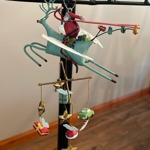 Santa on deer Ornament